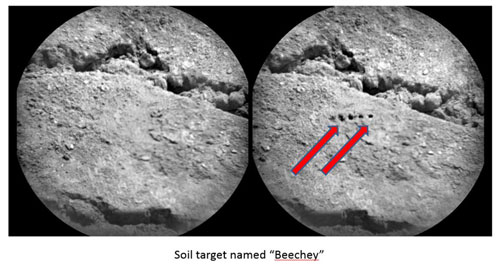 Two ChemCam images of the soil target named Beechey, with red arrows in the right image marking the pits left by the LIBS laser pulses