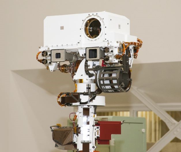 The ChemCam instrument mast unit, showing the telescope aperture, remote micro-imager, and the integrated camera package mounted on top of the rover mast